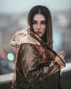 selective-focus-photo-of-woman-in-transparent-raincoat-2661983.jpg
